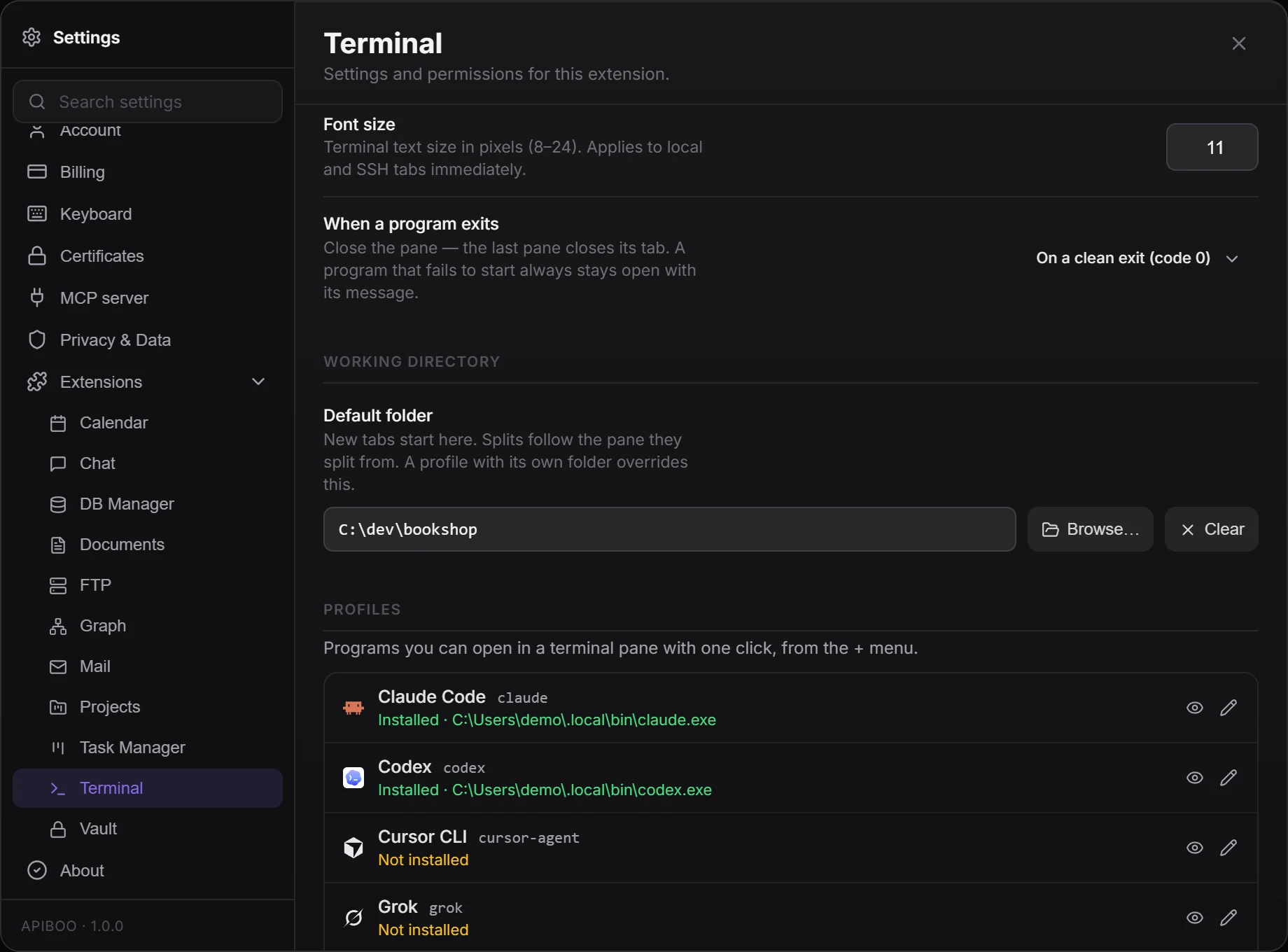 Settings → Extensions → Terminal: font size, When a program exits, the Default folder set to C:\dev\bookshop, and the Profiles list